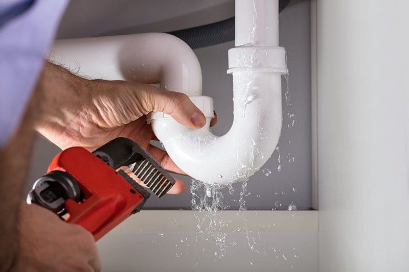 Plumbing Image-921346102 Plumbing fixing leaky pipe